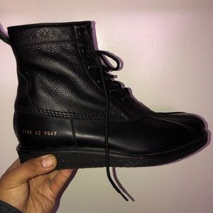 Common project. Black leather boots.
